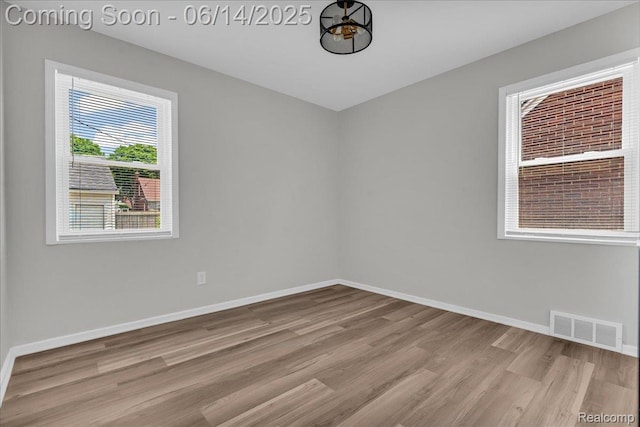 18336 Glastonbury Rd, Detroit, MI 48219 - empty room with wood finished floors and baseboards