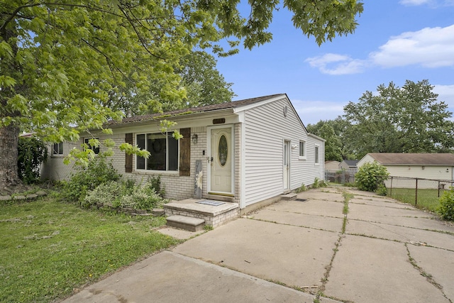 1143 S John Hix St, Westland, MI 48186 - view of front of home with brick siding