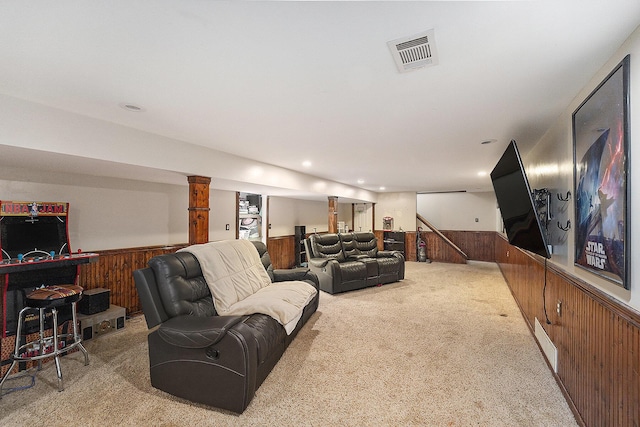 1143 S John Hix St, Westland, MI 48186 - carpeted living room featuring a wainscoted wall, wooden walls, recessed lighting, and stairway