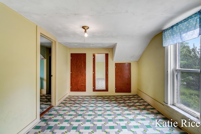 8974 Park St, Montague, MI 49437 - additional living space with tile patterned floors and baseboards