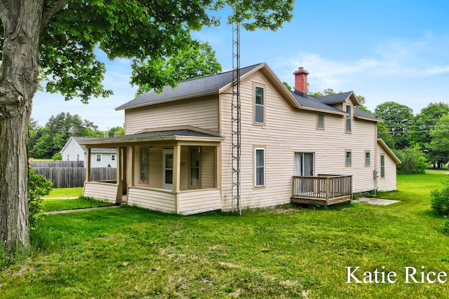 8974 Park St, Montague, MI 49437 - rear view of house with a chimney