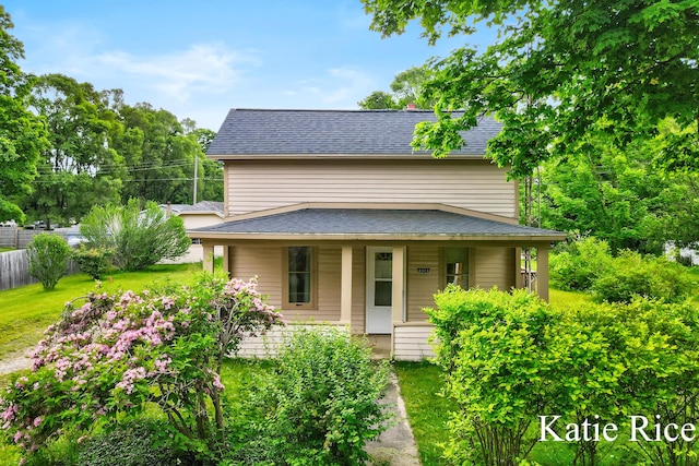 8974 Park St, Montague, MI 49437 - view of front of home featuring a porch and roof with shingles