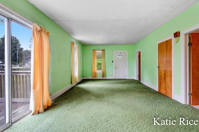 8974 Park St, Montague, MI 49437 - spare room featuring carpet floors and baseboards