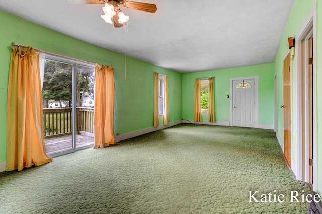 8974 Park St, Montague, MI 49437 - carpeted spare room with plenty of natural light and a ceiling fan