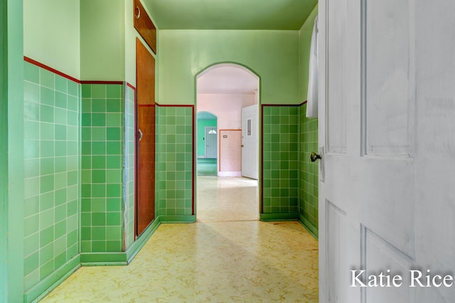 8974 Park St, Montague, MI 49437 - bathroom with tile walls and a wainscoted wall