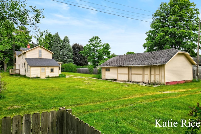 8974 Park St, Montague, MI 49437 - view of yard with a detached garage and an outdoor structure