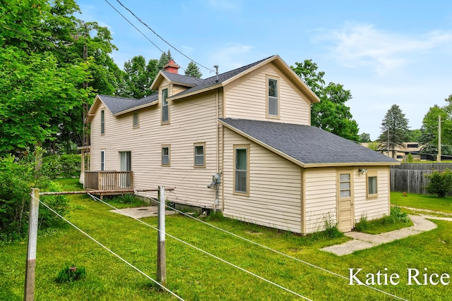8974 Park St, Montague, MI 49437 - rear view of house featuring roof with shingles