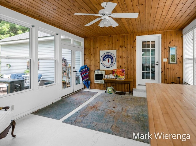 334 Terrill Ave, Grand Haven, MI 49417 - entryway with wood ceiling, wooden walls, a ceiling fan, and heating unit