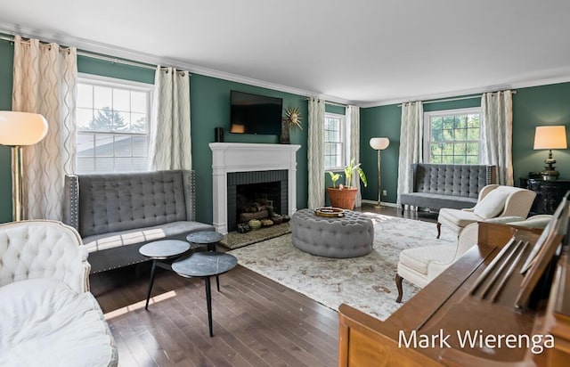 334 Terrill Ave, Grand Haven, MI 49417 - living area with ornamental molding, wood finished floors, and a fireplace