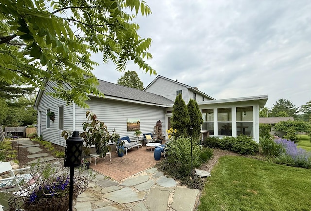 334 Terrill Ave, Grand Haven, MI 49417 - back of house with a wooden deck, a yard, a shingled roof, and a sunroom