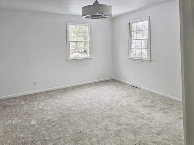 334 Terrill Ave, Grand Haven, MI 49417 - carpeted empty room with baseboards