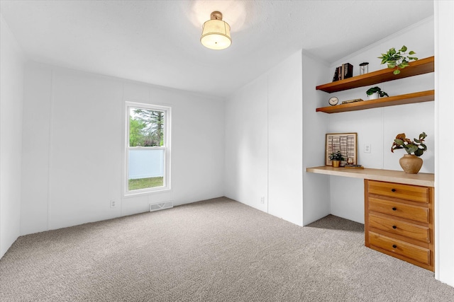 6626 Dennison Rd, Plainwell, MI 49080 - carpeted bedroom with built in desk
