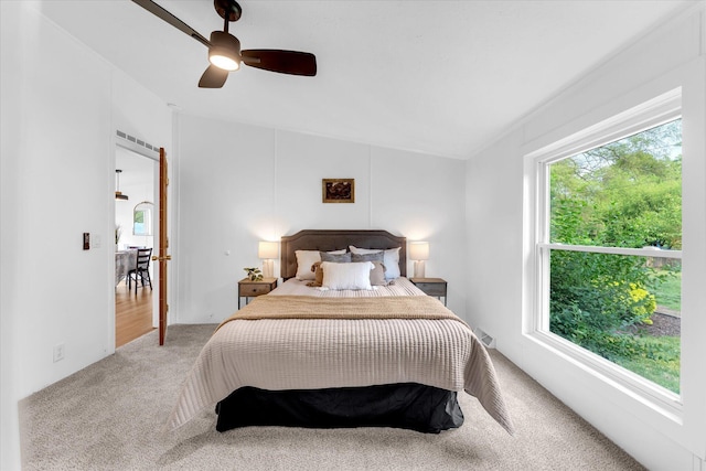 6626 Dennison Rd, Plainwell, MI 49080 - carpeted bedroom with ceiling fan and vaulted ceiling