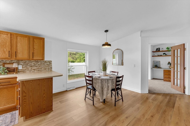 6626 Dennison Rd, Plainwell, MI 49080 - dining area featuring light wood finished floors and baseboards