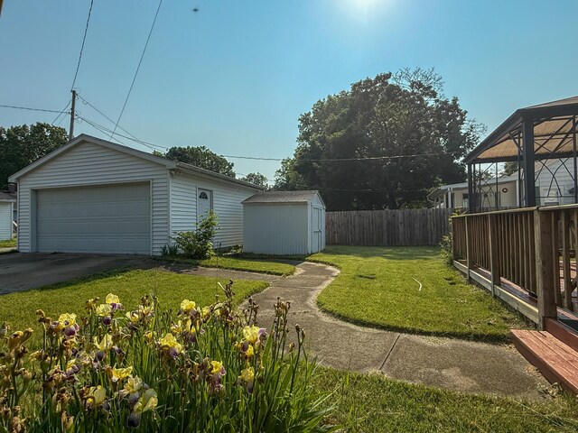 216 Bradley St, Dowagiac, MI 49047 - view of yard with an outbuilding and a detached garage