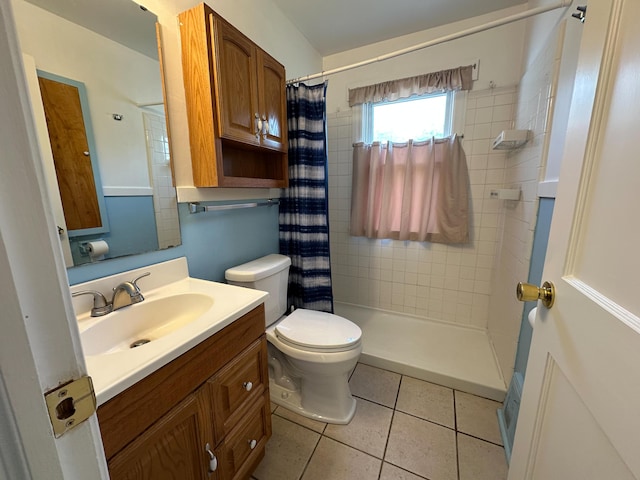216 Bradley St, Dowagiac, MI 49047 - full bath featuring vanity, tile patterned floors, and a tile shower