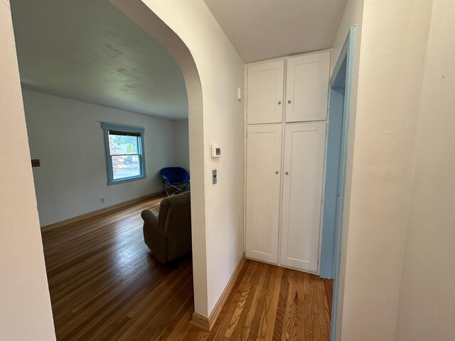 216 Bradley St, Dowagiac, MI 49047 - hall featuring arched walkways and wood finished floors