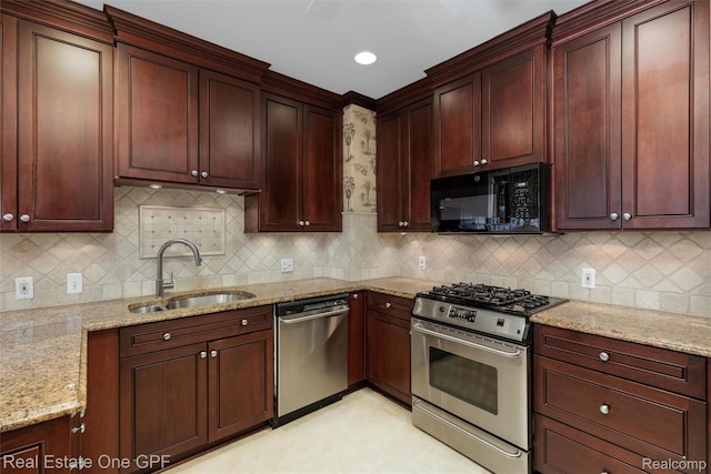 542 Cadieux Rd, Grosse Pointe, MI 48230 - kitchen featuring appliances with stainless steel finishes, light stone counters, and decorative backsplash