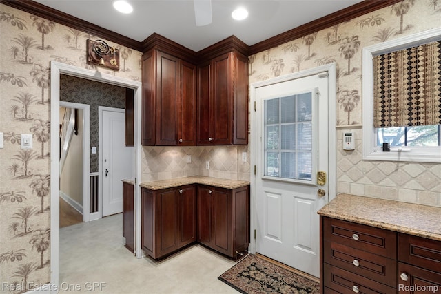 542 Cadieux Rd, Grosse Pointe, MI 48230 - kitchen with tasteful backsplash, crown molding, light stone countertops, wallpapered walls, and light flooring