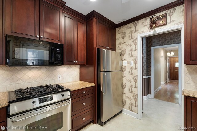 542 Cadieux Rd, Grosse Pointe, MI 48230 - kitchen with appliances with stainless steel finishes, wallpapered walls, tasteful backsplash, light stone countertops, and ornamental molding