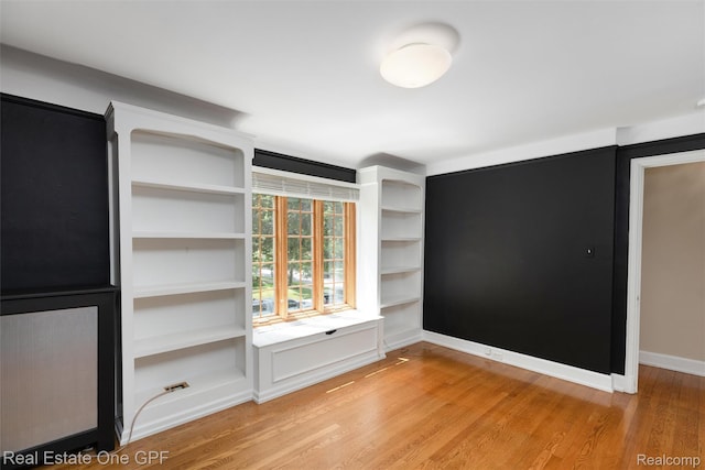 542 Cadieux Rd, Grosse Pointe, MI 48230 - unfurnished room with light wood-type flooring and baseboards