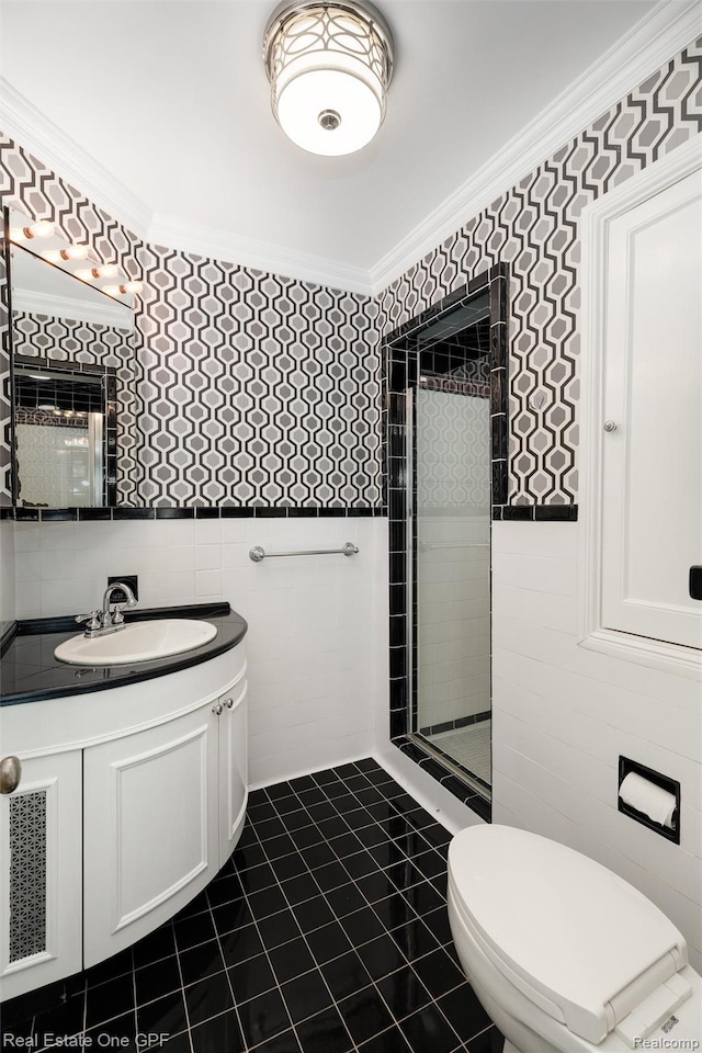 542 Cadieux Rd, Grosse Pointe, MI 48230 - bathroom featuring tile walls, vanity, a stall shower, ornamental molding, and tile patterned floors