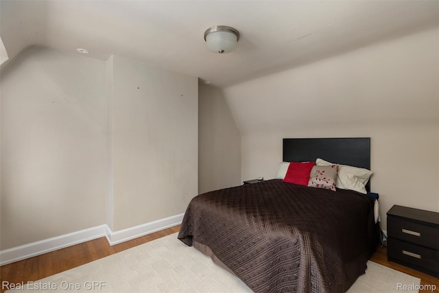542 Cadieux Rd, Grosse Pointe, MI 48230 - bedroom featuring lofted ceiling and wood finished floors