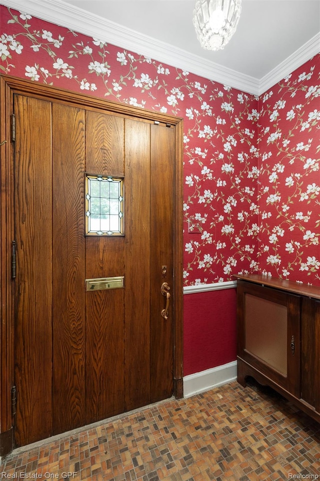 542 Cadieux Rd, Grosse Pointe, MI 48230 - entryway featuring ornamental molding and wallpapered walls