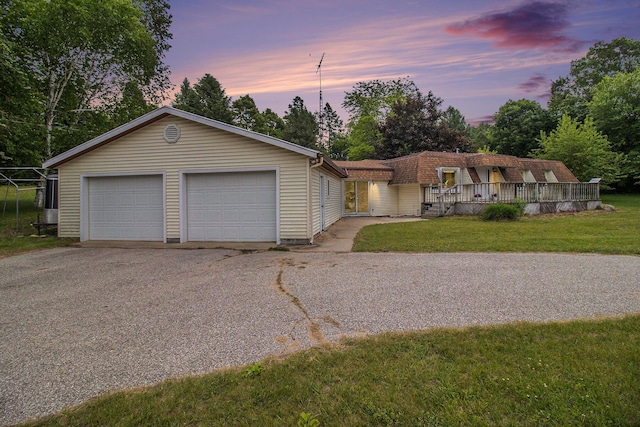 5890 N Oceana Dr, Hart, MI 49420 - view of front of property with a yard and a detached garage