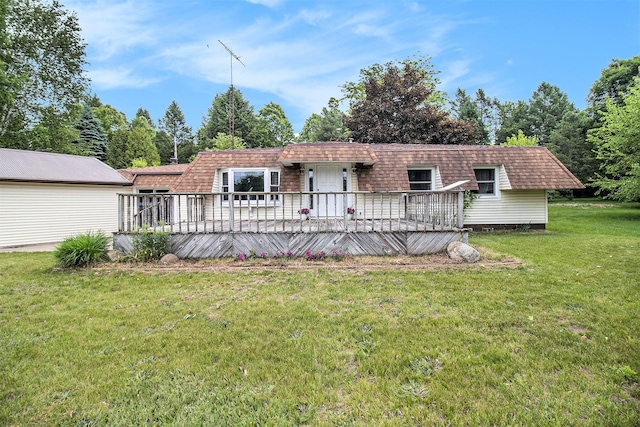 5890 N Oceana Dr, Hart, MI 49420 - rear view of property featuring a deck and a yard
