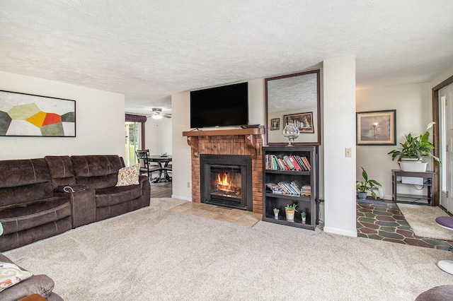 5890 N Oceana Dr, Hart, MI 49420 - living room featuring a brick fireplace, carpet, a textured ceiling, and a ceiling fan