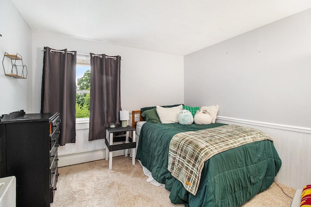 5890 N Oceana Dr, Hart, MI 49420 - bedroom featuring light carpet and baseboard heating
