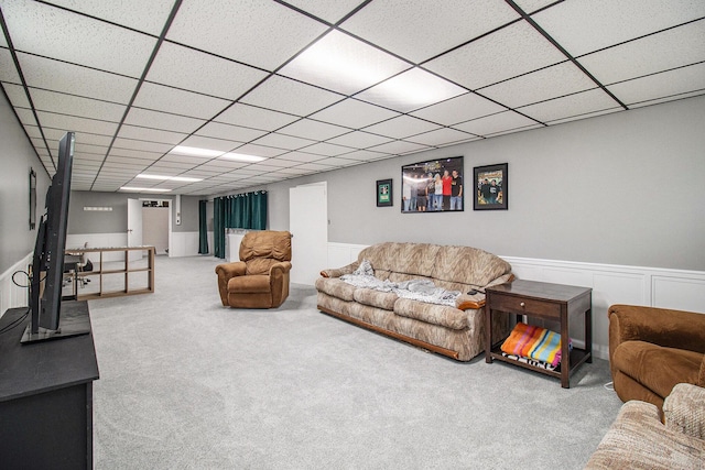 5890 N Oceana Dr, Hart, MI 49420 - carpeted living room featuring a drop ceiling and wainscoting