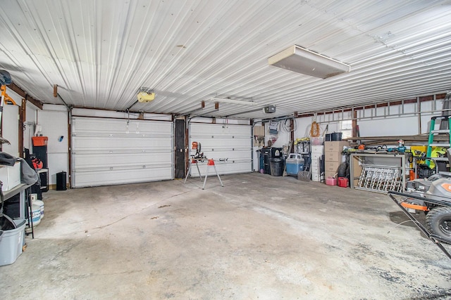 5890 N Oceana Dr, Hart, MI 49420 - garage featuring a garage door opener