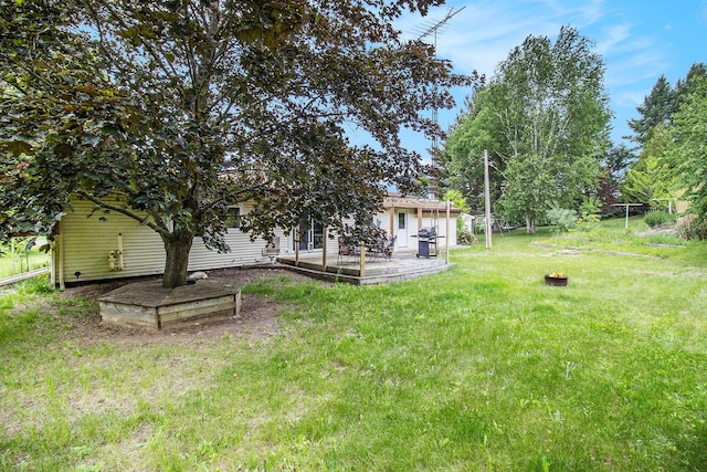 5890 N Oceana Dr, Hart, MI 49420 - view of green lawn with a patio
