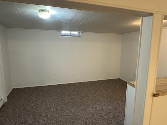7 S Normal St, Ypsilanti, MI 48197 - below grade area featuring dark carpet and a baseboard radiator