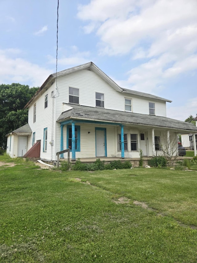 219 E Main St, Springport, MI 49284 - view of front of house with a porch and a front yard