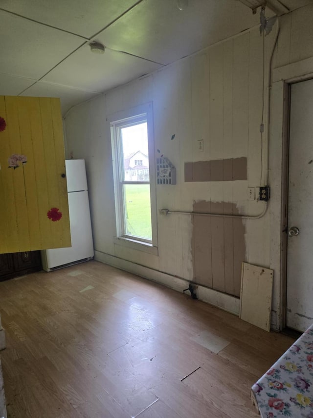 219 E Main St, Springport, MI 49284 - kitchen featuring freestanding refrigerator and wood finished floors
