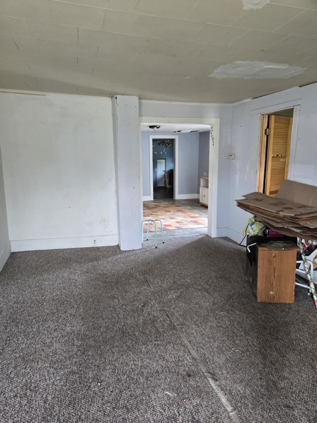 219 E Main St, Springport, MI 49284 - empty room with carpet floors and baseboards