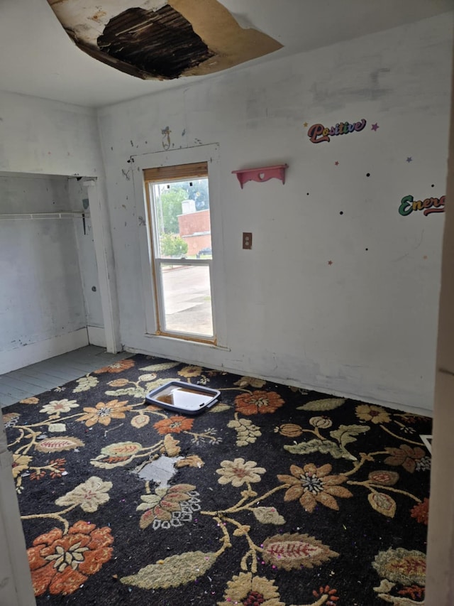 219 E Main St, Springport, MI 49284 - spare room featuring wood finished floors