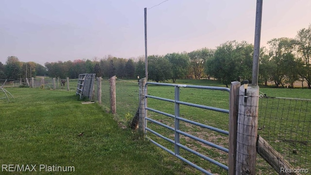 2025 W Rose Center Rd, Holly, MI 48442 - gate at dusk with a rural view