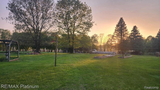 2025 W Rose Center Rd, Holly, MI 48442 - view of green lawn featuring a garden