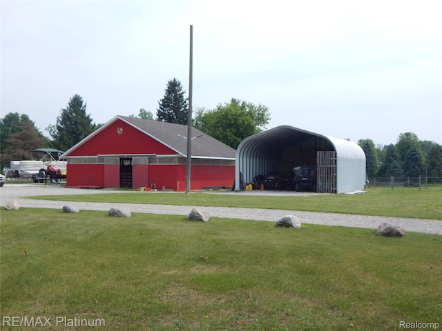 2025 W Rose Center Rd, Holly, MI 48442 - view of pole building with a yard and a detached carport