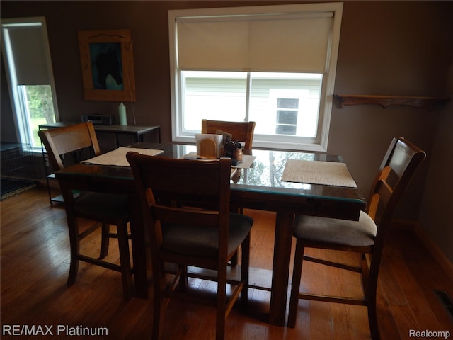2025 W Rose Center Rd, Holly, MI 48442 - dining room with healthy amount of natural light and wood finished floors