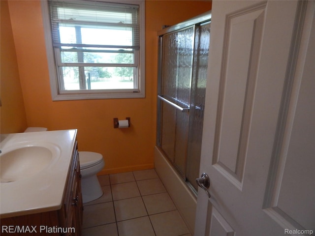 2025 W Rose Center Rd, Holly, MI 48442 - full bath featuring tile patterned flooring, vanity, and combined bath / shower with glass door