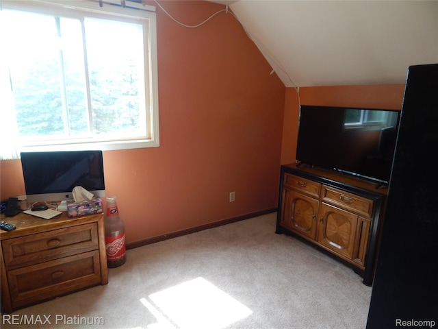 2025 W Rose Center Rd, Holly, MI 48442 - bedroom with vaulted ceiling and light colored carpet