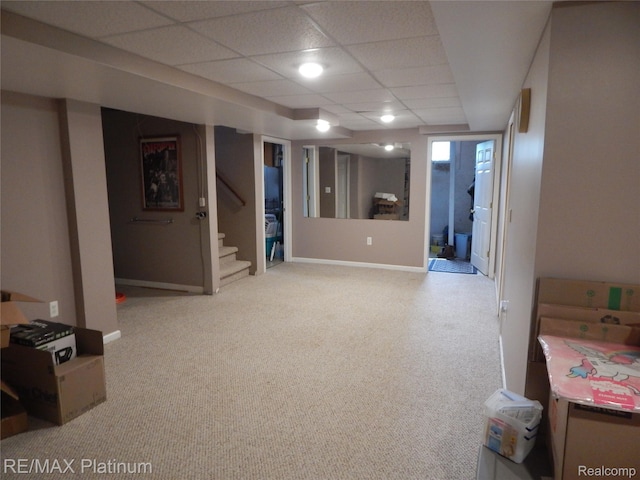 2025 W Rose Center Rd, Holly, MI 48442 - finished basement featuring carpet flooring, stairway, and a paneled ceiling