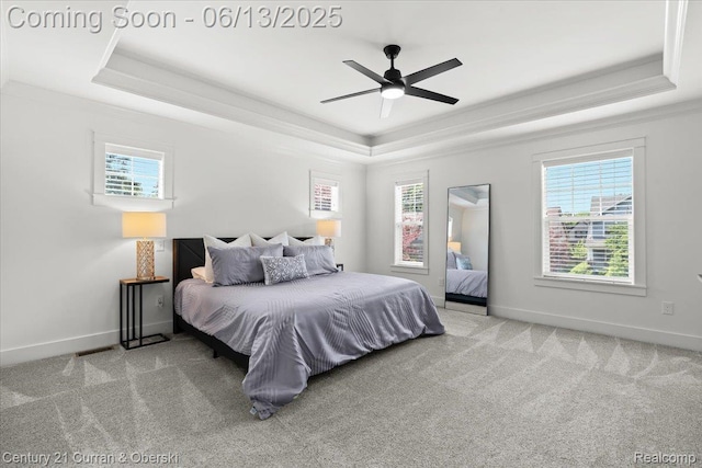 707 S Altadena Ave, Royal Oak, MI 48067 - carpeted bedroom featuring a raised ceiling, multiple windows, crown molding, and a ceiling fan