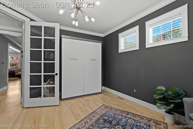 707 S Altadena Ave, Royal Oak, MI 48067 - unfurnished bedroom with a chandelier, crown molding, and wood finished floors