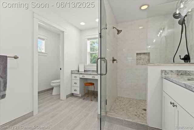707 S Altadena Ave, Royal Oak, MI 48067 - bathroom featuring vanity, a stall shower, plenty of natural light, wood finished floors, and recessed lighting